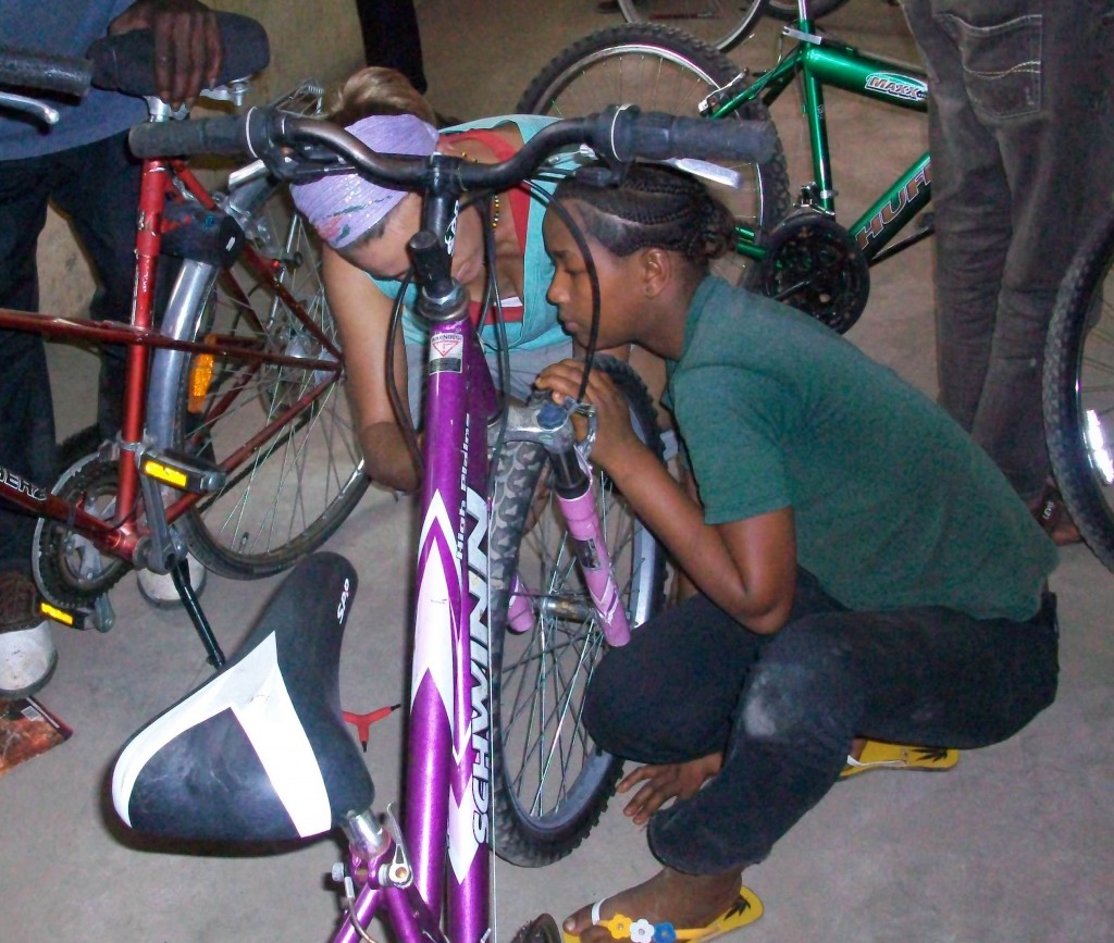 Britt18 teaching Hawanatu in maintenance workshop